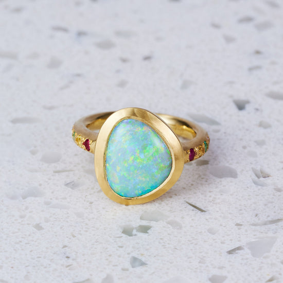 Load image into Gallery viewer, One-off Trilliant Black Opal Carnivale Ring in 18ct Yellow Gold, Size O and a half (In Stock)
