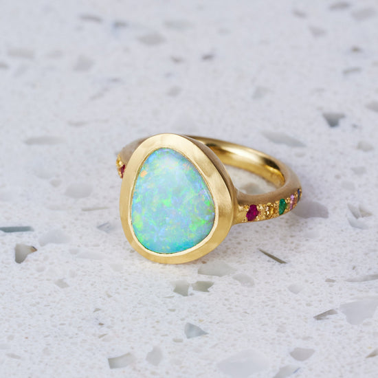 Load image into Gallery viewer, One-off Trilliant Black Opal Carnivale Ring in 18ct Yellow Gold, Size O and a half (In Stock)
