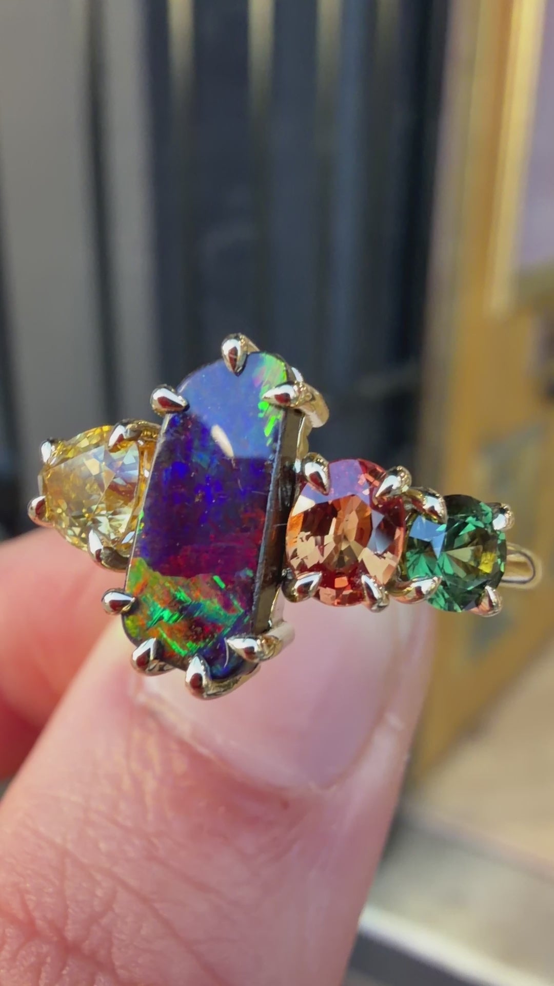 Load and play video in Gallery viewer, One-off Boulder Opal And Sapphire Splice Ring In 18ct Yellow Gold, Size P and a half (In Stock)
