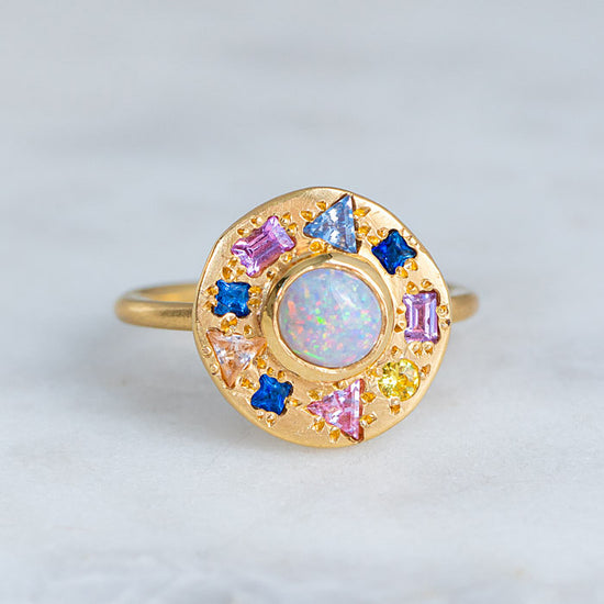Opal And Shades Of Sapphires Orbiting Pebble Ring
