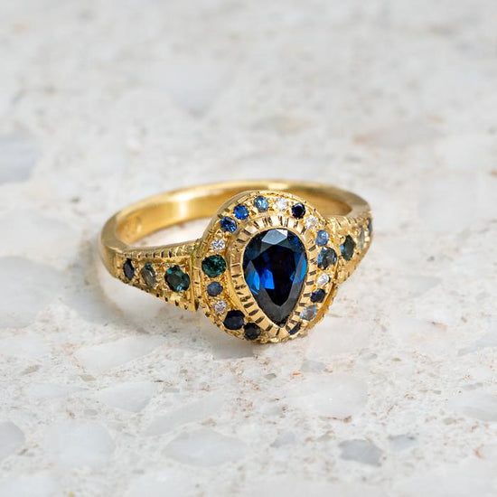 Shades of Blue Sapphire Roman Ring
